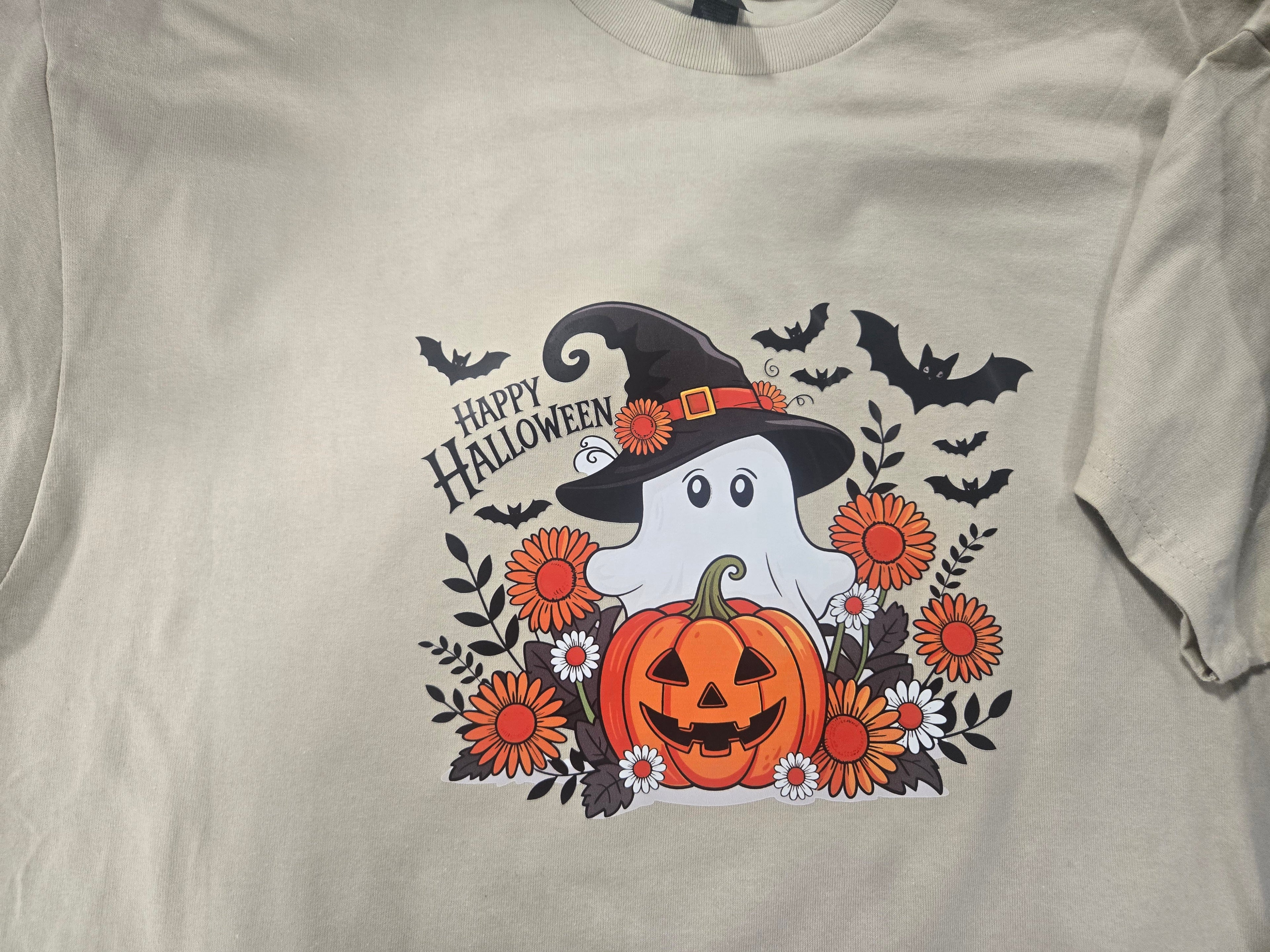 Happy Halloween with ghost, pumpkins, and bats.